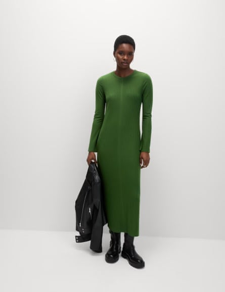 Model wearing a green midi knitted dress