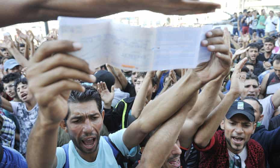 Refugees demonstrate at the closure of Keleti station in Budapest on Tuesday.