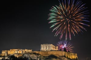 Fireworks explode over the Acropolis in Athens
