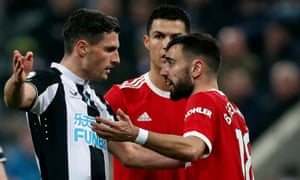 Bruno Fernandes clashes with Newcastle United’s Fabian Schar .