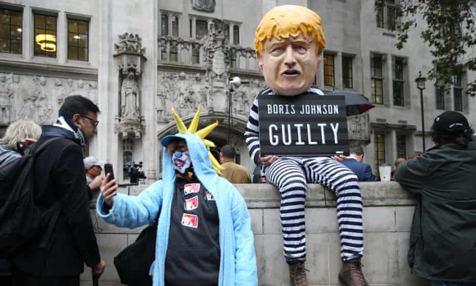 A protester dressed as Boris Johnson outside the supreme court  in central London