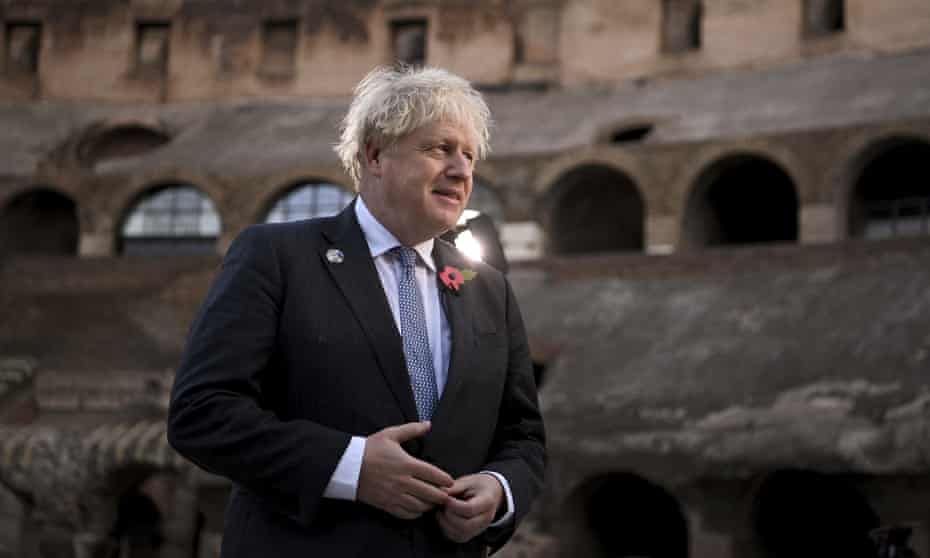 Boris Johnson on a visit to the Colosseum during the G20 summit in Rome, Italy.