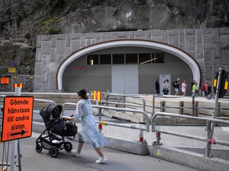 The entrance to the Katarinaberget bunker is a large, industrial door on a rock face.