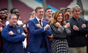 West Ham vice-chair Karren Brady with players and staff.
