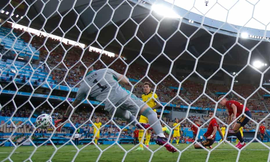 Robin Olsen saves Dani Olmo’s header.