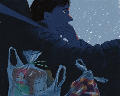 A woman driving in a blizzard with groceries in the passenger seat.