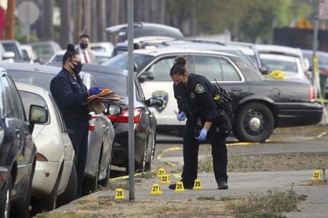 Members of the Oakland police department investigate the scene of an officer-involved shooting on 4 November 2020.