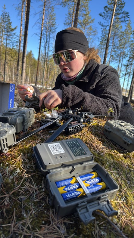 Crew member Maja Edlund setting up equipment.