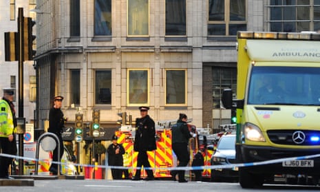 Police and emergency vehicles gather near London Bridge after the attack in Fishmongers’ Hall in November 2019
