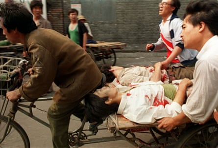 Wounded people being carried to hospital after the Tiananmen Square massacre on 4 June 1989.