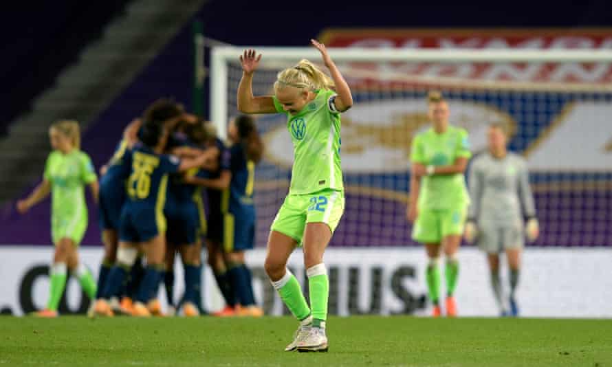 Pernille Harder, then of Wolfsburg, looks dejected as Lyon celebrate during the 2020 final