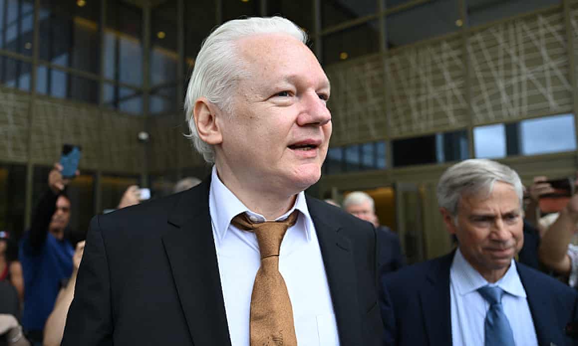 Assange leaves the US federal courthouse in Saipan, Northern Mariana Islands