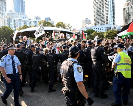 Protesters and NSW police clash during an attempted blockade by the Palestine Action Group at the weapons expo at the ICC Sydney