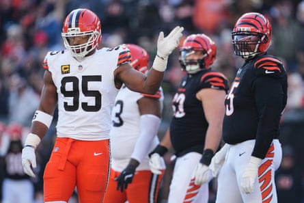 Myles Garrett points his hand after a defensive play during a game with the Cleveland Browns.
