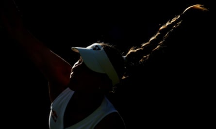 Elena Rybakina smashes during her victory over Alize Cornet.