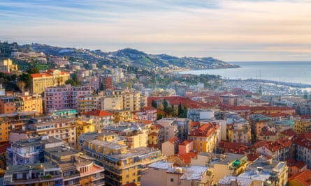 Sunset cityscape of Sanremo with sea and colourful buildings