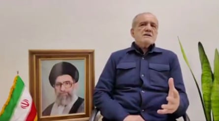 The Iranian president, Masoud Pezeshkian, speaking to a camera