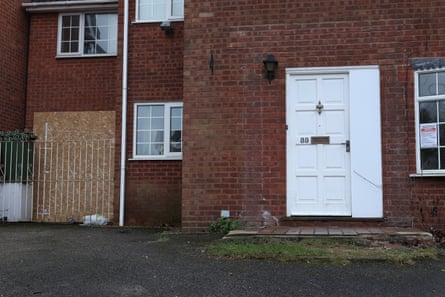 The front of a red brick house.