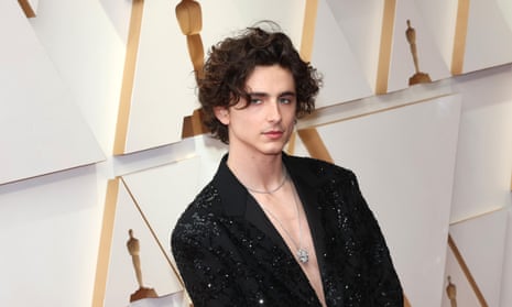 Timothée Chalamet bares his chest on the 94th annual Academy Awards red carpet