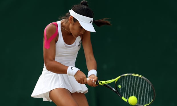 Raducanu playing a girls singles match at Wimbledon in 2017