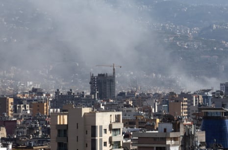 Smoke rises from buildings in Beirut, Lebanon on Friday.