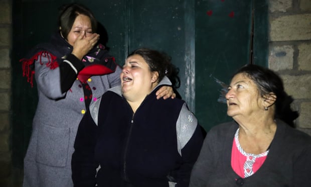 Local women react after the strike.