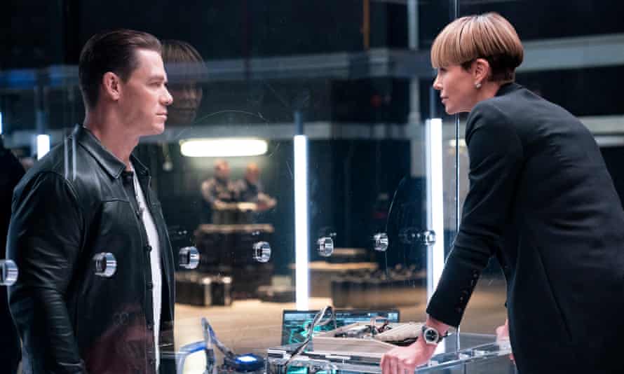 Go-faster gripes ... John Cena and Charlize Theron square up in Fast & Furious 9.