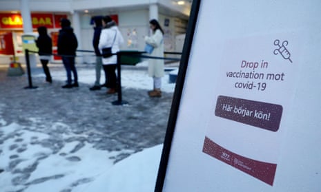 Queue for Covid-19 vaccinations in a shopping centre in Linköping, Sweden.