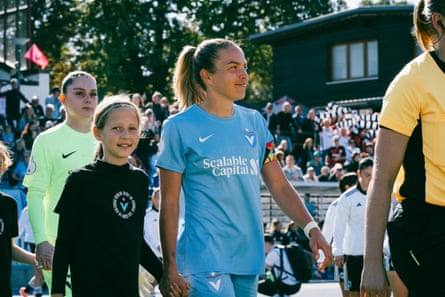 Viktoria Berlin players walk out before a match