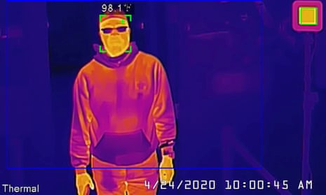 A Dahua thermal camera takes a man’s temperature during a demonstration in San Francisco.