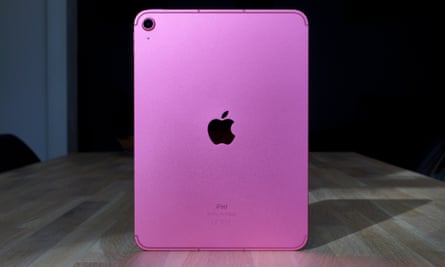 The back panel of the iPad is pink.