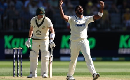 Jasprit Bumrah celebrates after taking the wicket of Steve Smith