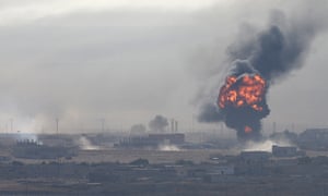 An explosion in the Syrian border town of Ras al-Ayn, which Turkish forces were attempting to capture.