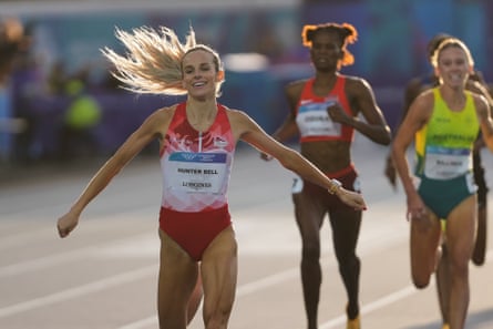 Georgia Hunter Bell stretches retired her arms arsenic she wins the 800m.