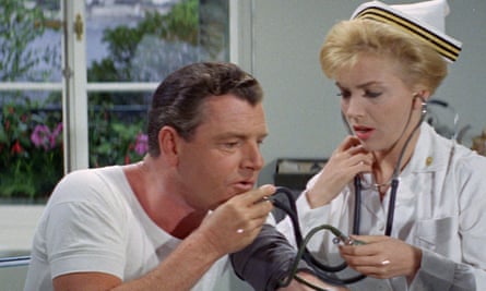 Kenneth More as Lt-Commander ‘Bodger’ Badger and Joan O’Brien as a US Navy nurse in Toye’s star-studded comedy We Joined the Navy, 1962.