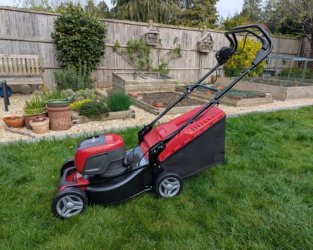 A Mountfield lawnmower in a garden