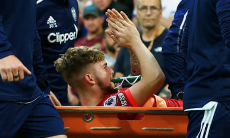 Harvey Elliott applauds the crowd at Leeds as he is taken off on a stretcher on Sunday.