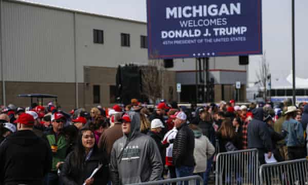 Supporters are waiting in line before the rally.