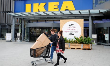 Couple leaving Ikea store with purchases