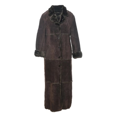 A long brown shearling coat on a white background