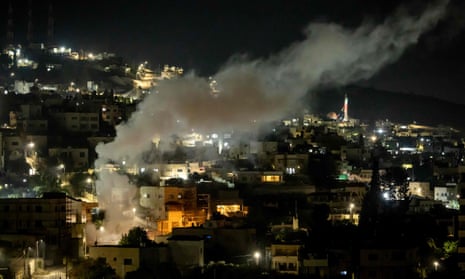 Smoke billows during a raid by the Israeli armed forces in the occupied West Bank Jenin refugee camp on 16 November 2023. At least 190 Palestinians have been killed in the West Bank since 7 October, according to the Palestinian Authority's health ministry.