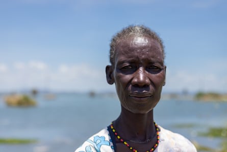Ayanae Loon’gorio stands on the lakeshore in Long’ech