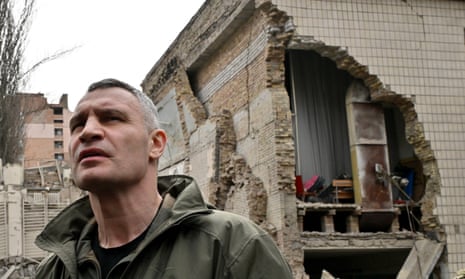 Kyiv's mayor, Vitali Klitschko, outside a building badly damaged by Russian missile strikes on the Ukrainian capital on Monday.