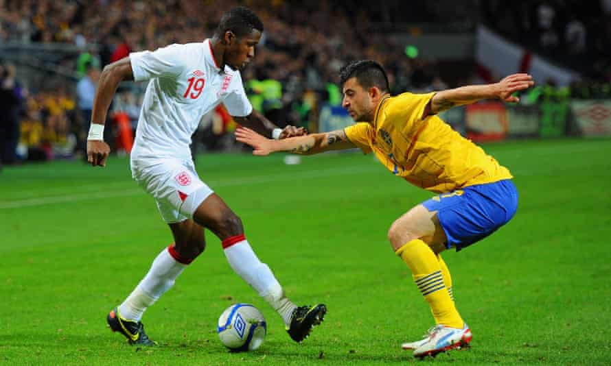 Wilfried Zaha on his England debut takes on Sweden’s Behrang Safari in November 2012.