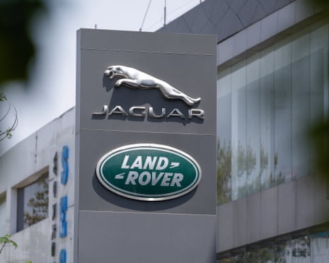 Jaguar and Land Rover logos outside a building