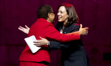 Kamala Harris and Karen Bass greet each other the Nate Holden Performing Arts Center in Los Angeles.