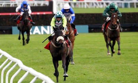 Cyrname (blue colours) finishing second behind Clan Des Obeaux in theKing George at Kempton.
