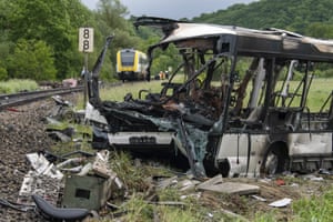 Blaustein, Germany A wrecked bus stands at the railway track after a collision with a train near Ulm. Several people were injured when the bus collided with the train at a railroad crossing in southern Germany