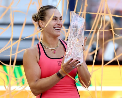 Aryna Sabalenka holds the Butch Buchholz trophy after defeating Coco Gauff in the Miami Open women’s singles final