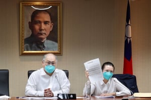 Taiwanese pro-democracy and human rights activist Lee Ming-che, left, and wife Lee Ching-yu.